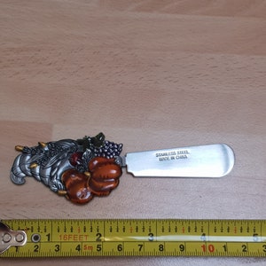 vintage glass on enamel metal thanksgiving pumpkin knife piece 1960s kitsch kitchen souvenir piece