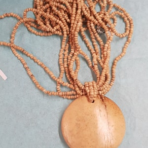 antique bone 1900s victorian souvenir pendant jewellery item unusual kitsch piece statement item