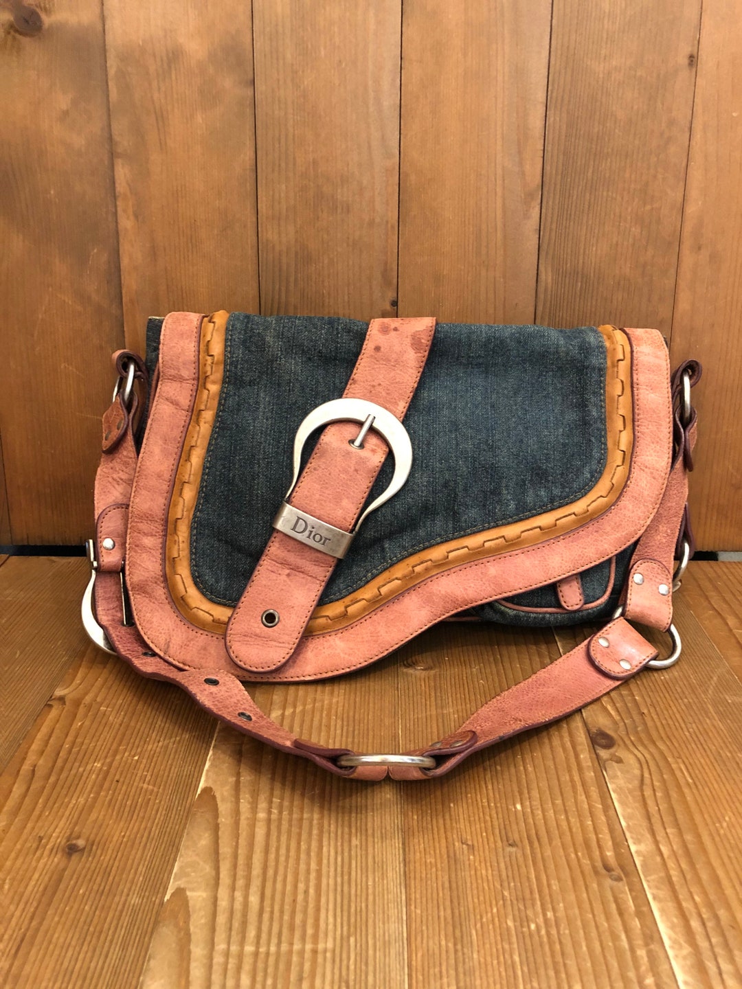 Bolso gaucho dior sale