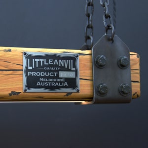 May include: A rustic wooden light fixture with a metal frame and chain. The fixture has a silver metal plaque with the text "LITTLEANVIL - QUALITY PRODUCT TBL 02 MELBOURNE AUSTRALIA".