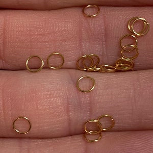 Anéis de salto abertos fortes de aço inoxidável banhado a ouro rosa claro 4 mm 23ga (21287)