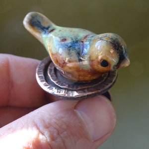 Copper ring with a bird...