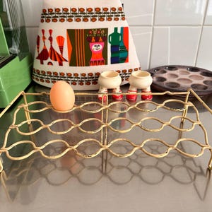 Vintage Tomado Holland äggställ plastbelagd tråd äggdispenser Vintage femtiotalet gul