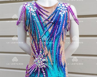May include: A blue, purple, and white leotard with rhinestones and a scalloped bottom.