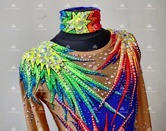 May include: A brown leotard with long sleeves and a rainbow design. The leotard is decorated with rhinestones and has a matching rainbow neckband.