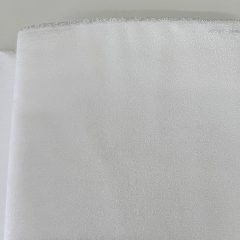 Muslin Mates Swirls White cotton quilting fabric by Moda – tonal white swirls print on 100% cotton, 44" wide