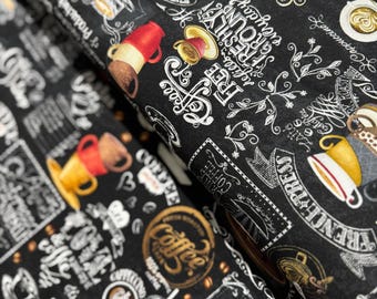 May include: Black and white fabric with a coffee theme. The fabric features a variety of coffee-related illustrations, including coffee cups, coffee beans, and text that says "Coffee & Friends".