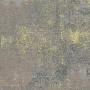 Może przedstawiać: Teksturowane tło z subtelnym, nakrapianym wzorem w odcieniach szarości i żółci.