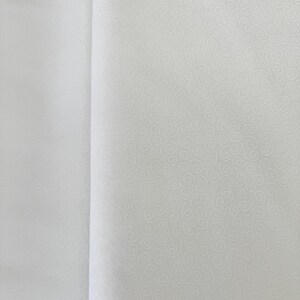 Muslin Mates Swirls White cotton quilting fabric by Moda – tonal white swirls print on 100% cotton, 44" wide