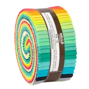 May include: A rolled bundle of fabric strips in a spectrum of colours, from black to bright blue, green, yellow, and pink. The roll is held together by a brown band with the text "HELLO MY NAME IS Roll-Up". Ideal for quilting and crafting projects.