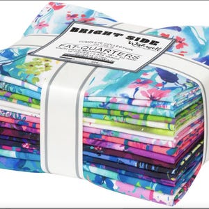 May include: A stack of 20 fat quarter fabric squares in a variety of bright colors and floral patterns. The fabric is labeled "Bright Side Wishwell Complete Collection Fat Quarters".