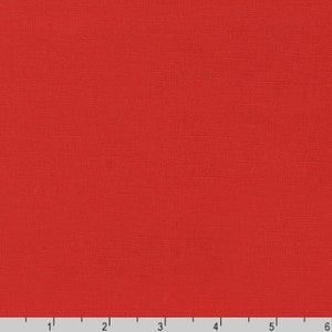 Puede incluir: Una tela roja lisa con una superficie texturizada. La tela tiene una apariencia tejida y está iluminada uniformemente, mostrando los detalles del tejido. El color es un rojo vibrante y cálido.