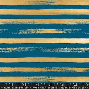 May include: Teal fabric with horizontal gold brushstroke stripes. The fabric has a textured appearance, with the gold stripes appearing slightly raised. The bottom of the fabric has a ruler with the text "RUBY STAR SOCIETY".