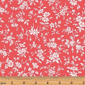 May include: White floral print fabric on a red background. The fabric has a repeating pattern of small white flowers and leaves.