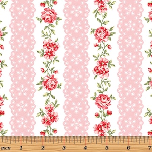 May include: White fabric with pink and white vertical stripes. The stripes are made of a delicate lace pattern.  Red roses and smaller red flowers are arranged in vertical lines between the stripes.