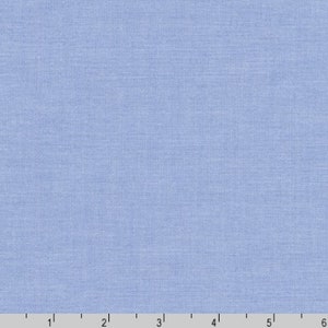 Puede incluir: Una tela azul claro sólida con una textura tejida sutil.