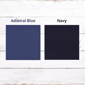 May include: Two fabric swatches, one in a dark blue shade labeled "Admiral Blue" and the other in a darker blue shade labeled "Navy".