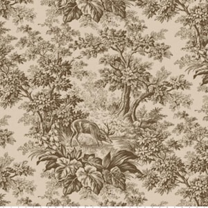 May include: A fabric featuring a repeating toile pattern in dark brown ink on a light beige background. The design depicts a deer grazing near a stream surrounded by dense trees and foliage. A white ruler is visible at the bottom edge, showing 14 inches.