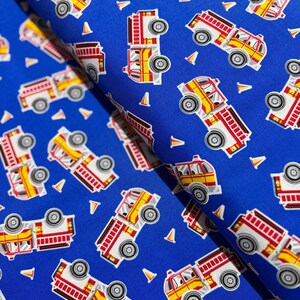 Glow in the Dark - Save the Day - Fire Engines on Blue Fabric by Kanvas Studio - Cotton Fabric