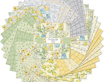 May include: A set of 24 fabric squares featuring a lemon and daisy theme. The squares are in shades of yellow, green, and gray. The fabric squares are arranged in a fan shape. The text "Zest for Life" is printed on one of the squares.