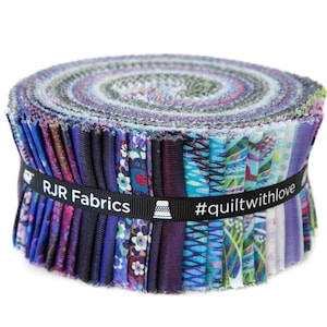 May include: A roll of RJR Fabrics fabric strips in shades of blue, purple, and teal. The fabric is held together with a black band that reads "RJR Fabrics" and "#quiltwithlove". The fabric strips are stacked in a circular shape.