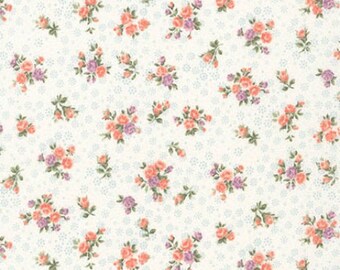 May include: A white fabric with a repeating pattern of small pink and purple floral bouquets. The background is a light blue with a subtle pattern of tiny dots.
