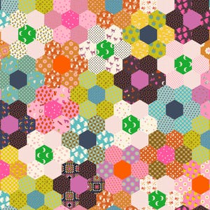 May include: A colorful patchwork quilt with a floral pattern. The quilt features hexagon-shaped pieces in various colors and patterns, including polka dots, moons, and floral designs. The overall design is a vibrant mix of pink, yellow, orange, and green.