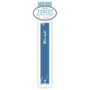 May include: A blue zipper with a silver pull tab. The zipper is packaged on a white card with a blue and white checkered pattern. The card has the text "Happy Zippers" in a blue oval.