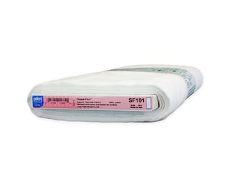 May include: A white roll of Pellon Shape-Flex fusible interfacing fabric. The label reads "Shape-Flex" and "SF101".
