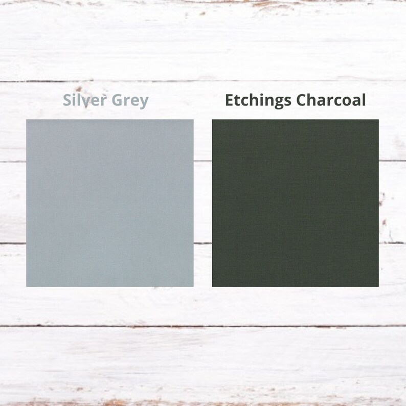 May include: Two fabric swatches, one is a light gray color labeled "Silver Grey" and the other is a dark green color labeled "Etchings Charcoal".