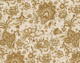 May include: A beige fabric with a brown paisley pattern. The pattern features intricate floral designs and swirls.