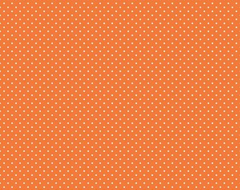 May include: Orange fabric with a white polka dot pattern. The fabric is 12 inches wide and has a ruler with inches marked along the bottom.