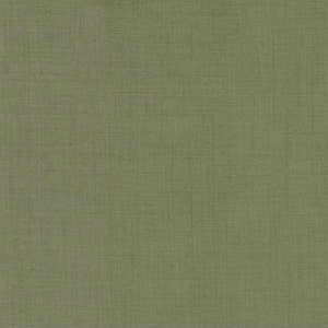 May include: A close-up of a green fabric with a subtle woven texture.