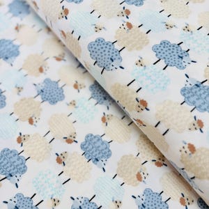 Sweet Dreams Flannel Fabric: Stacked Sheep White Cotton Flannel