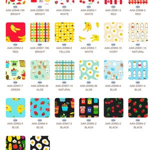 May include: A collection of 18 fabric swatches featuring various patterns and colors. The patterns include strawberries, cherries, bananas, eggs, milk bottles, and a picnic basket. The colors include red, white, yellow, green, blue, and black.
