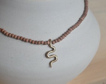 anaya necklace, natural dyed and hand crafted bronze snake pendant, unique