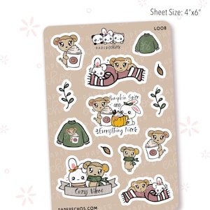 May include: A sticker sheet with various fall-themed illustrations. The sheet includes images of cute animals, coffee cups, pumpkins, sweaters, and the phrases "Pumpkin Spice and Everything Nice" and "Cozy Vibes". Sheet size is 4"x6".