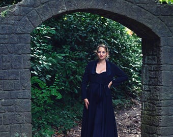Black tuxedo inspired jumpsuit with long jacket and velvet lapels