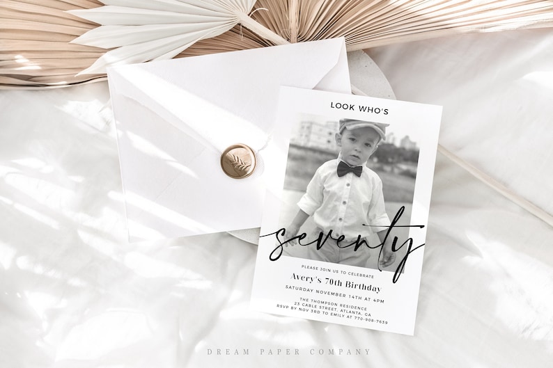May include: Black and white birthday invitation with a photo of a young boy wearing a bow tie and a cap. The invitation says "Look Who's Seventy" and includes details for the birthday party.