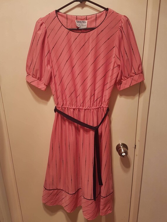 pink and black spot dress