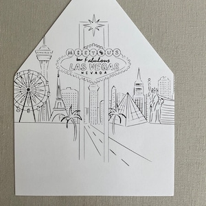 May include: A black and white illustration of the Las Vegas skyline, featuring the iconic "Welcome to Fabulous Las Vegas, Nevada" sign, the Eiffel Tower, a Ferris wheel, palm trees, and other buildings.