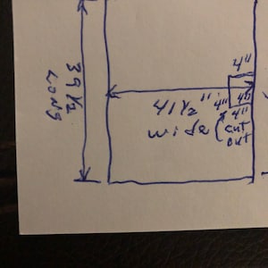 May include: Hand-drawn diagram of a garment pattern with measurements in inches. The pattern is for a garment that is 39 1/2 inches long and 41 1/2 inches wide. The diagram includes a note that says "4 1/2 cut out".