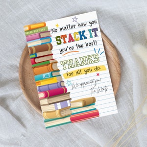 May include: A colorful thank you card with a stack of books and the text "No matter how you STACK IT you're the best! THANKS for all you do. We appreciate you! The Wents"