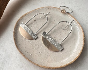 Sun and sand arched dangle earrings