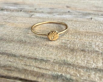 Sand textured disc ring