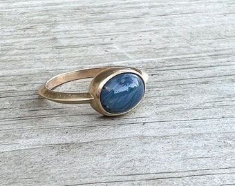 14k gold Leland blue ring with triangle band.
