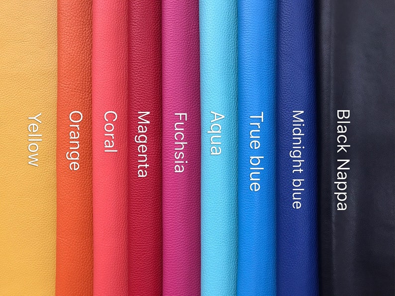 May include: A selection of leather swatches in various colors, including yellow, orange, coral, magenta, fuchsia, aqua, true blue, midnight blue, and black nappa.
