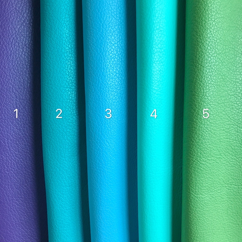 May include: Five different colors of leather swatches, numbered 1 through 5. The swatches are arranged vertically from left to right. The colors are purple, teal, blue, turquoise, and green.