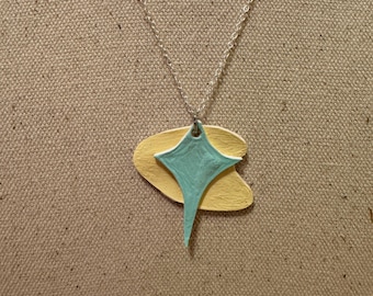 Atomic boomerang necklace
