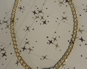 Gold boomerang necklace
